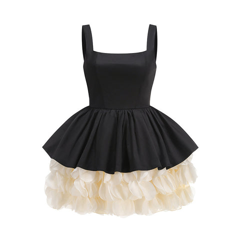 Elegant Black Sleeveless Dress with Cream Ruffled Hem